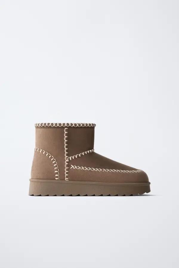 STIEFELETTE MIT FELLFUTTER UND ZIERNAeHTEN - фото товара