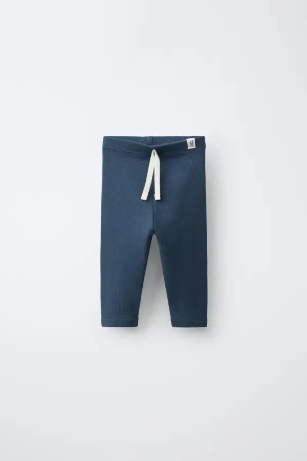 LEGGINGS MIT RIPPENMUSTER UND ETIKETT - фото товара