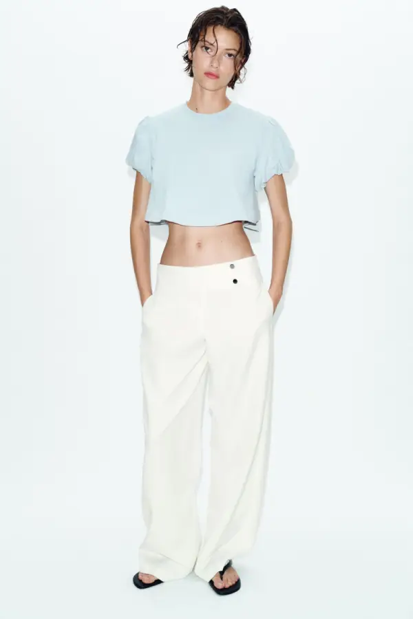 CROP-TOP MIT VOLUMINOeSEN AeRMELN - фото товара