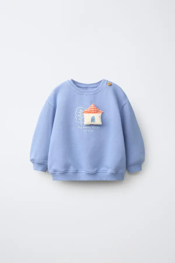 SWEATSHIRT MIT PATCHWORK-HAUS - фото товара