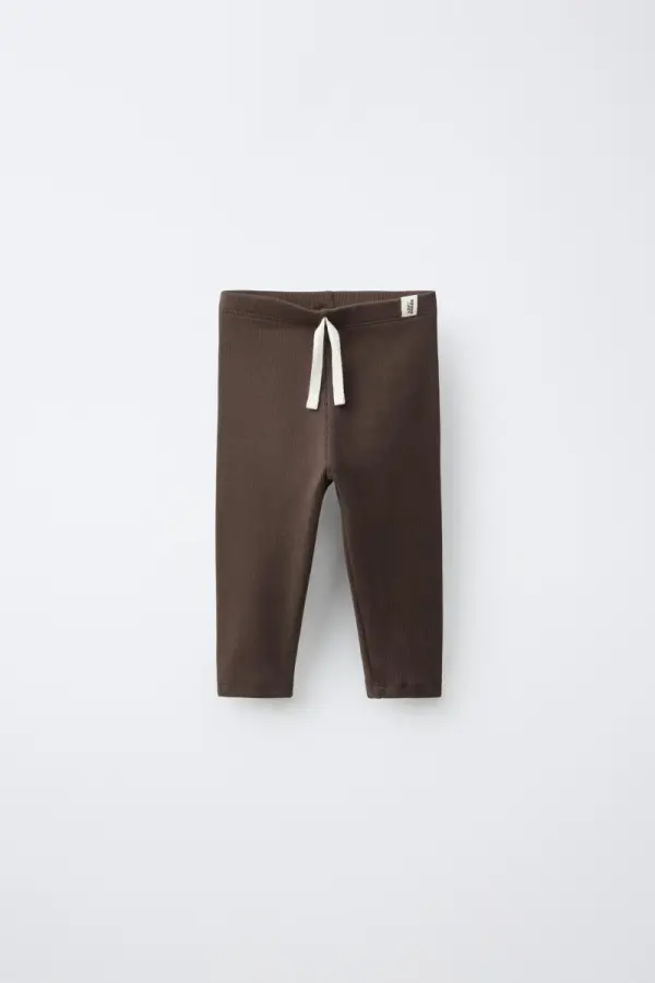 GERIPPTE LEGGINGS MIT ETIKETT - фото товара